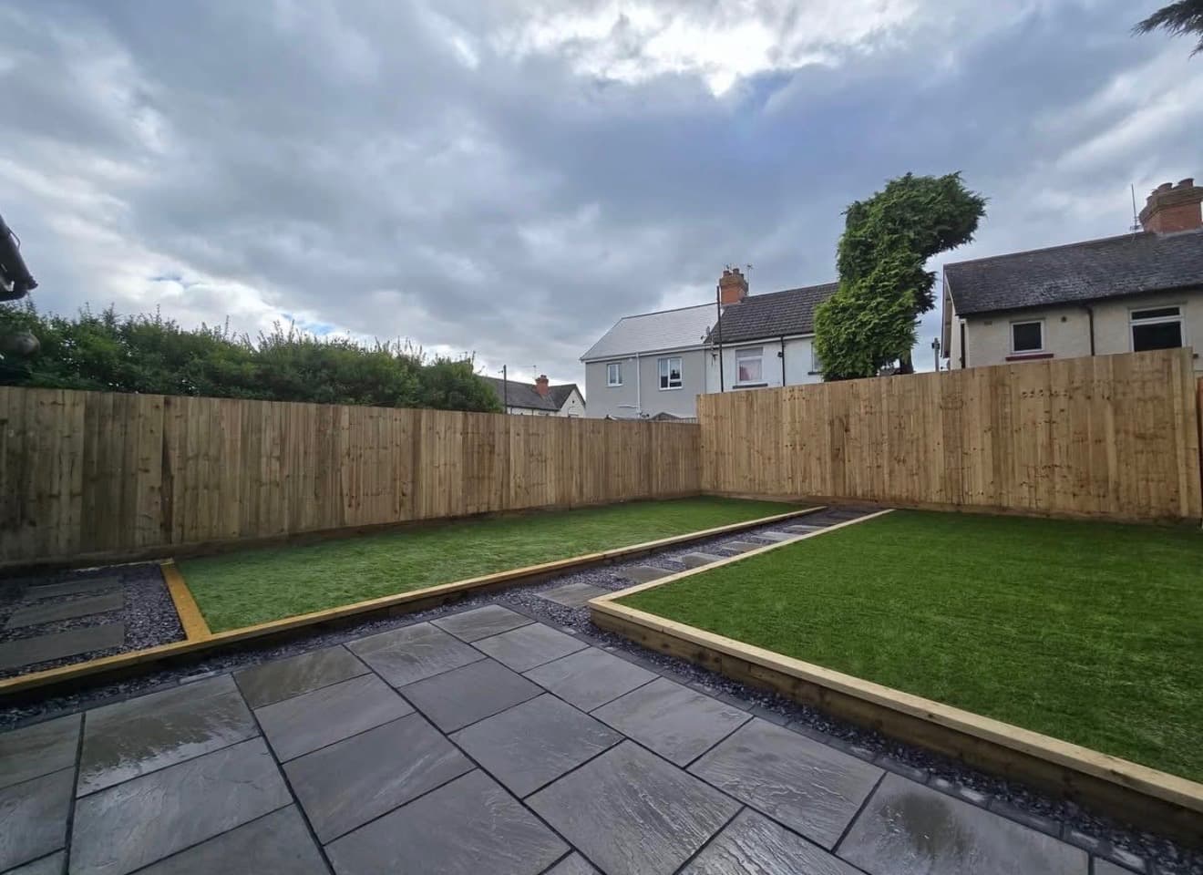 Timber fencing with landscaped lawns in South Wales